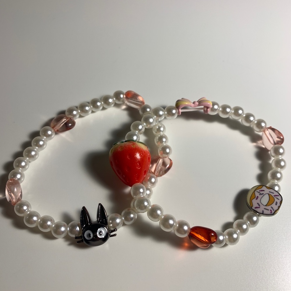 2 Kiki’s delivery service themed bracelets